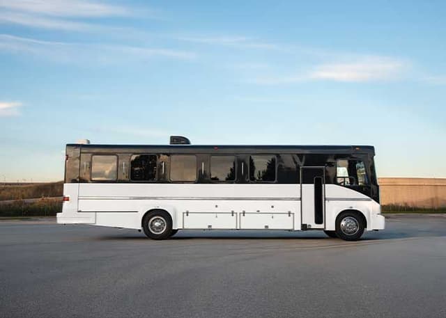 27/30 Passenger Party Bus for luxury car rental in Georgetown, ON